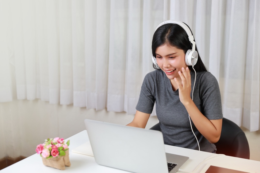 young girl learning a new language online