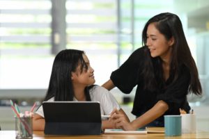 mother discussing current events with daughter