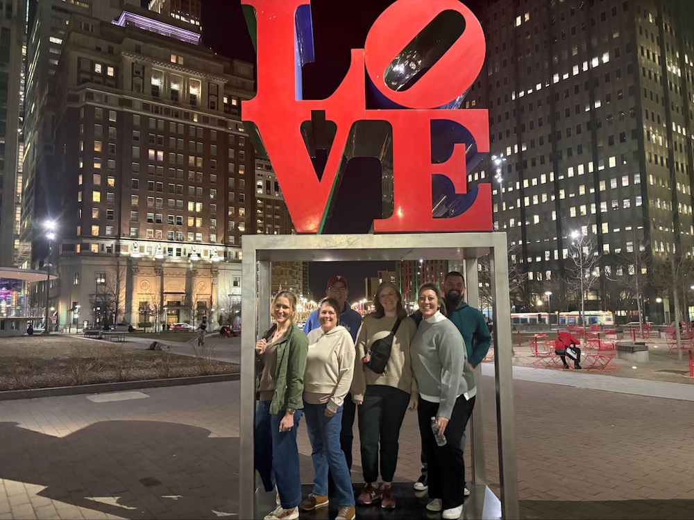 WTMA staff as the LOVE sign during WTMA Spring Break 2026