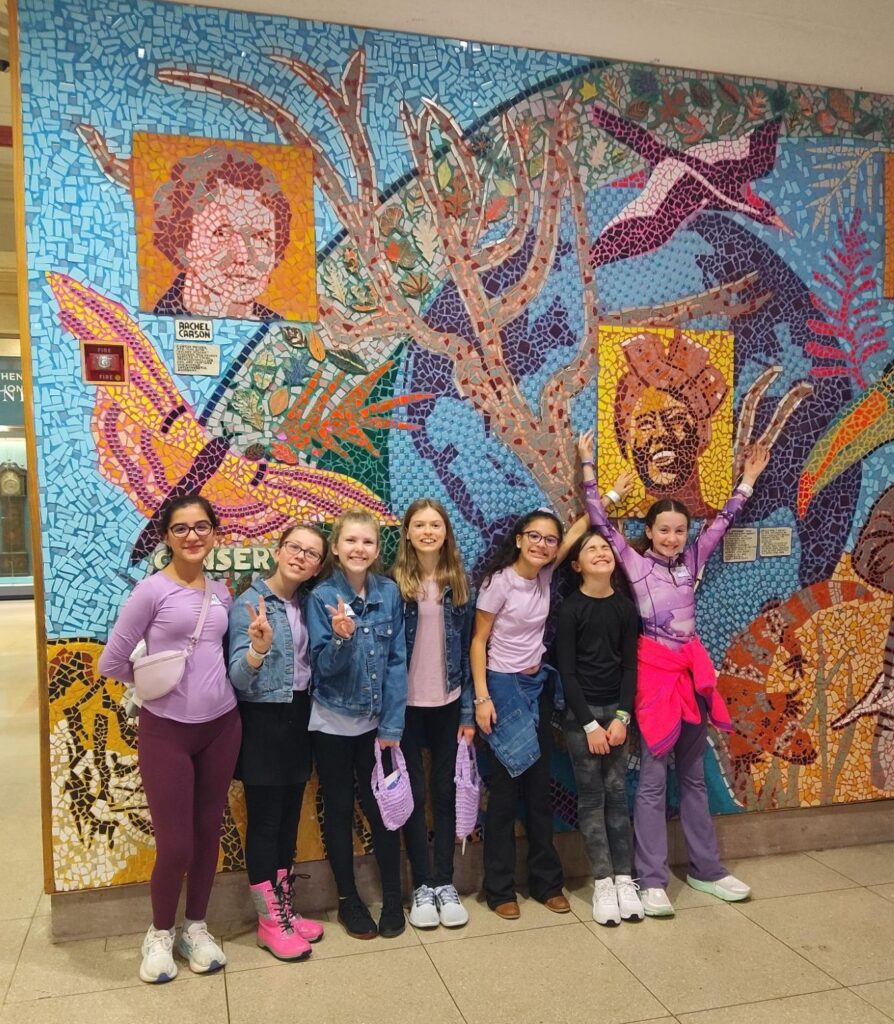 WTMA spring break 2026 posing in front of a mural