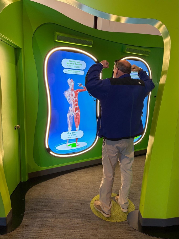 Mr. Patullo showing off his muscles.